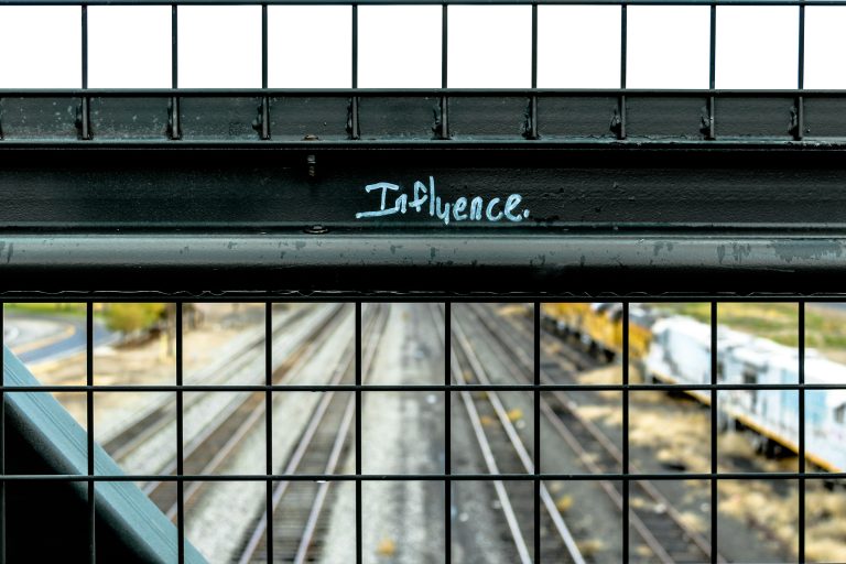 Influence painted black metal frame during daytime